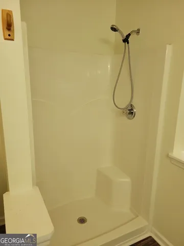 a bathroom with a bathtub