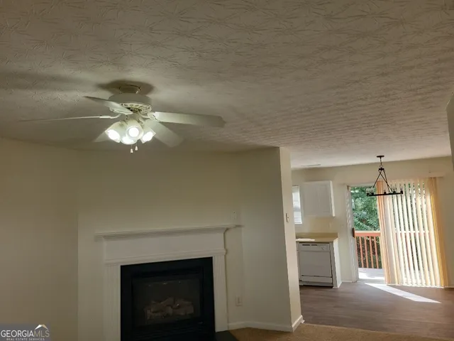 a view of a livingroom with a fireplace
