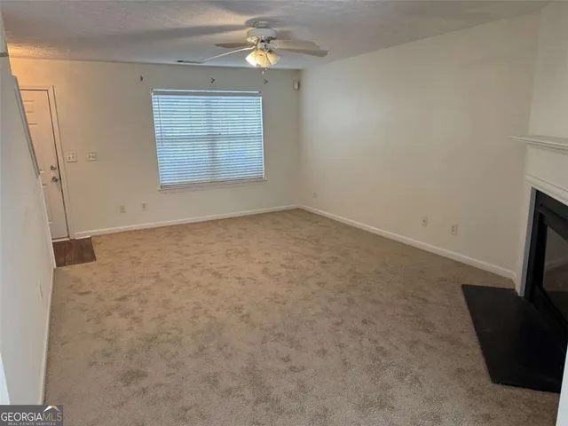 an empty room with windows