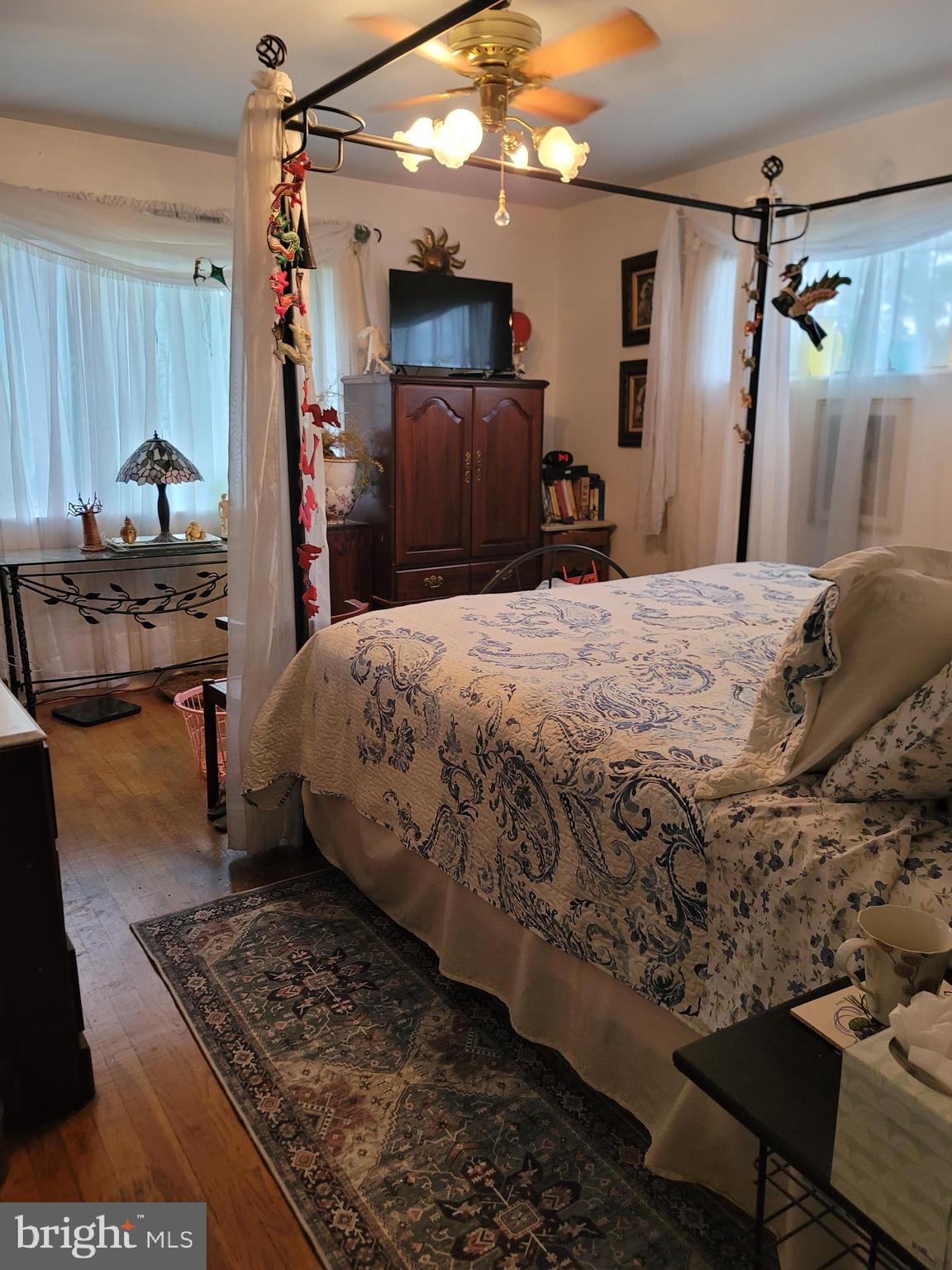 6910 Gilbert Street Springfield, VA 22150 - Photo 10 of 29 a bedroom with a bed and a mirror