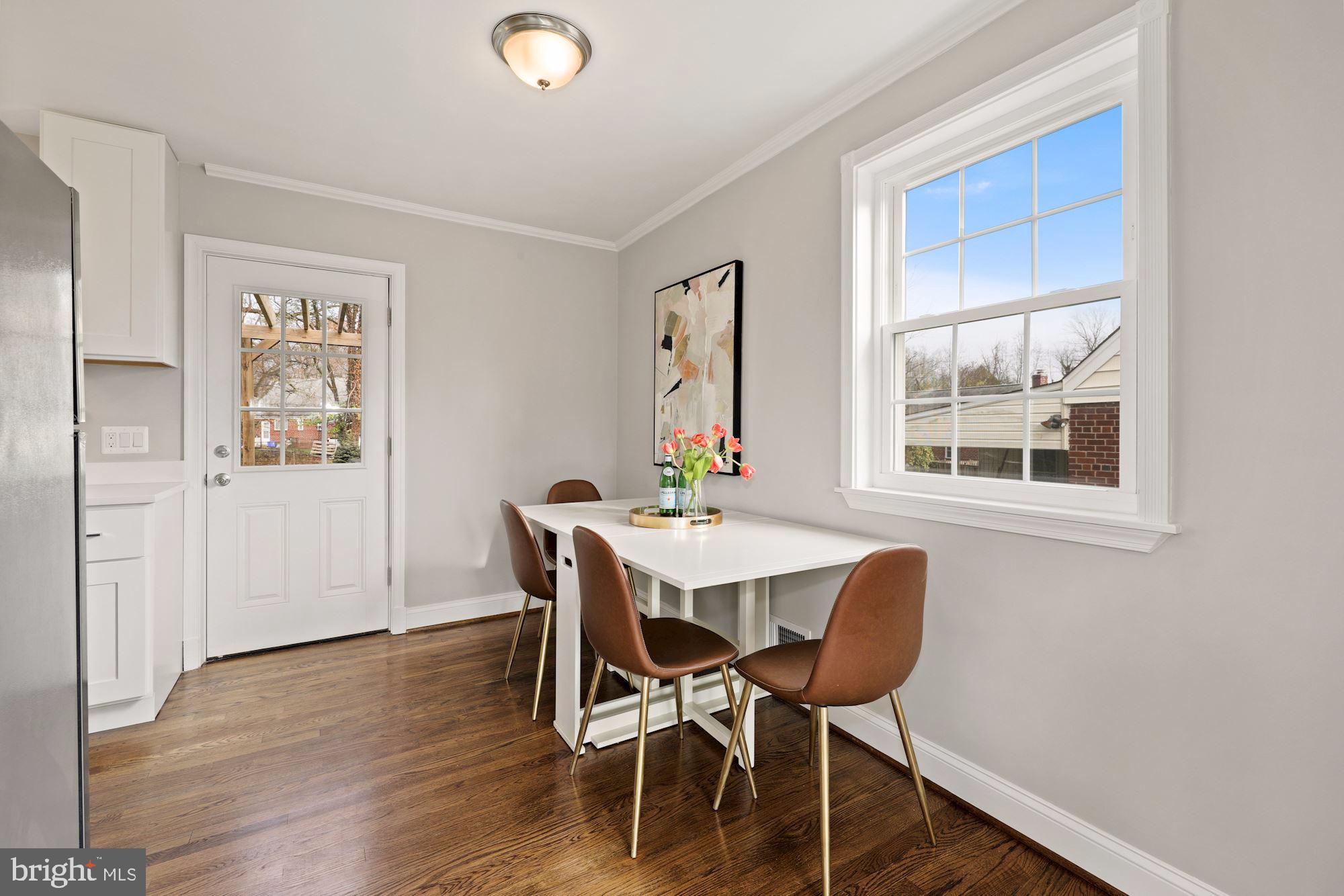 3809 Elby Street Silver Spring, MD 20906 - Photo 7 of 19 Open Dining Room Opens to Kitchen and Backyard