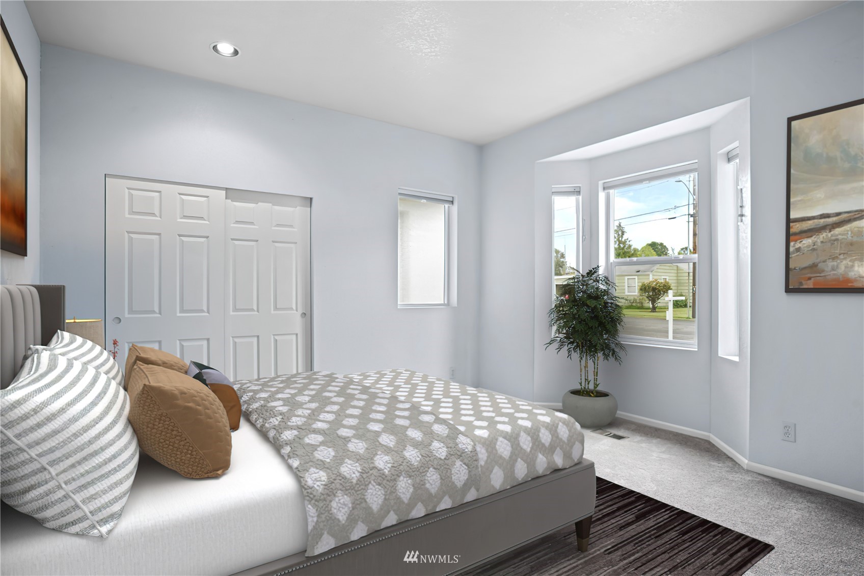 801 High Avenue South Renton, WA 98057 - Photo 16 of 29 a bedroom with a bed and a window