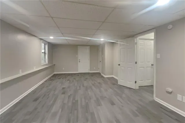 a kitchen with stainless steel appliances granite countertop a stove top oven sink and cabinets