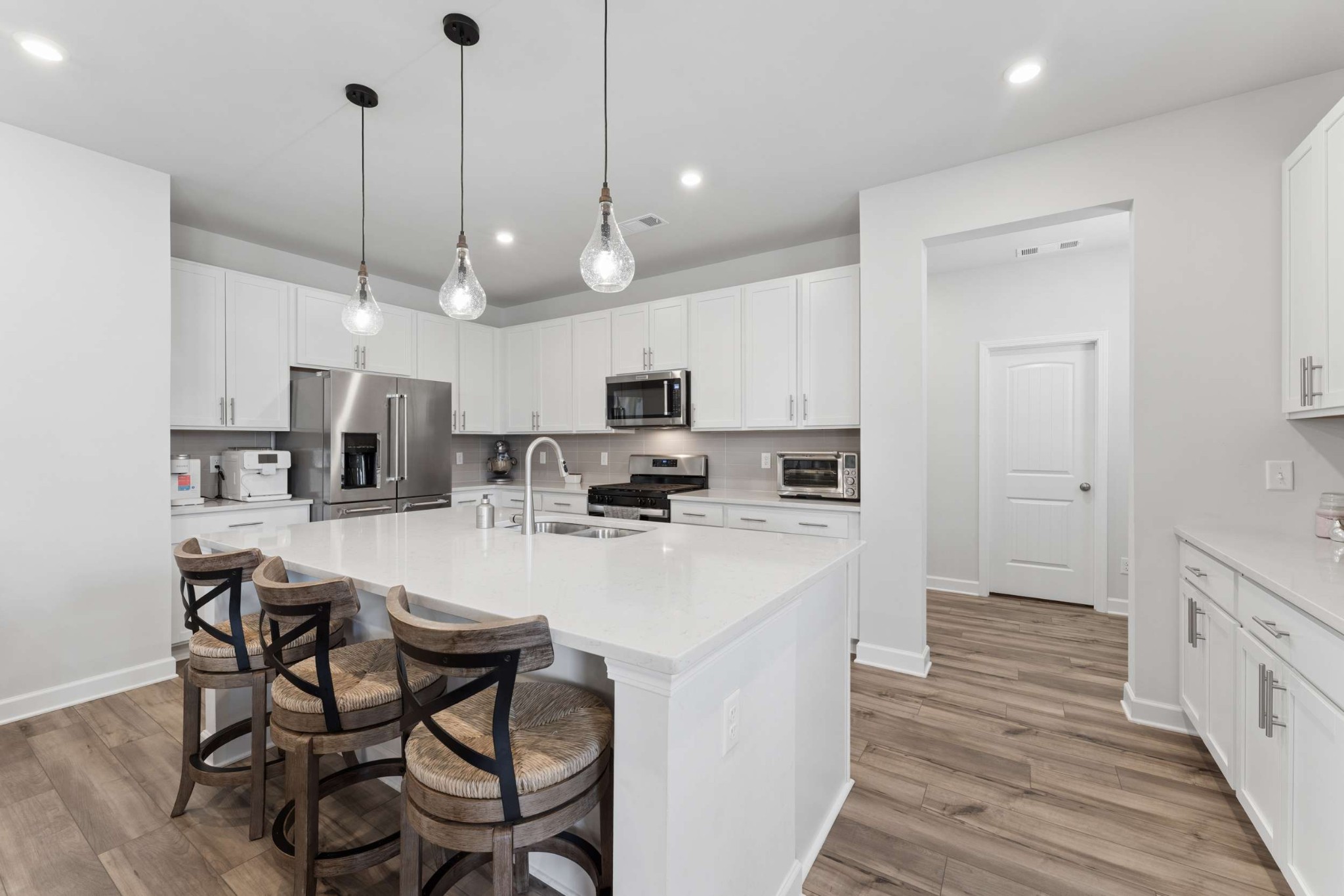 4107 Dwight Way Murfreesboro, TN 37128 - Photo 11 of 41 a kitchen with stainless steel appliances kitchen island granite countertop a sink and cabinets