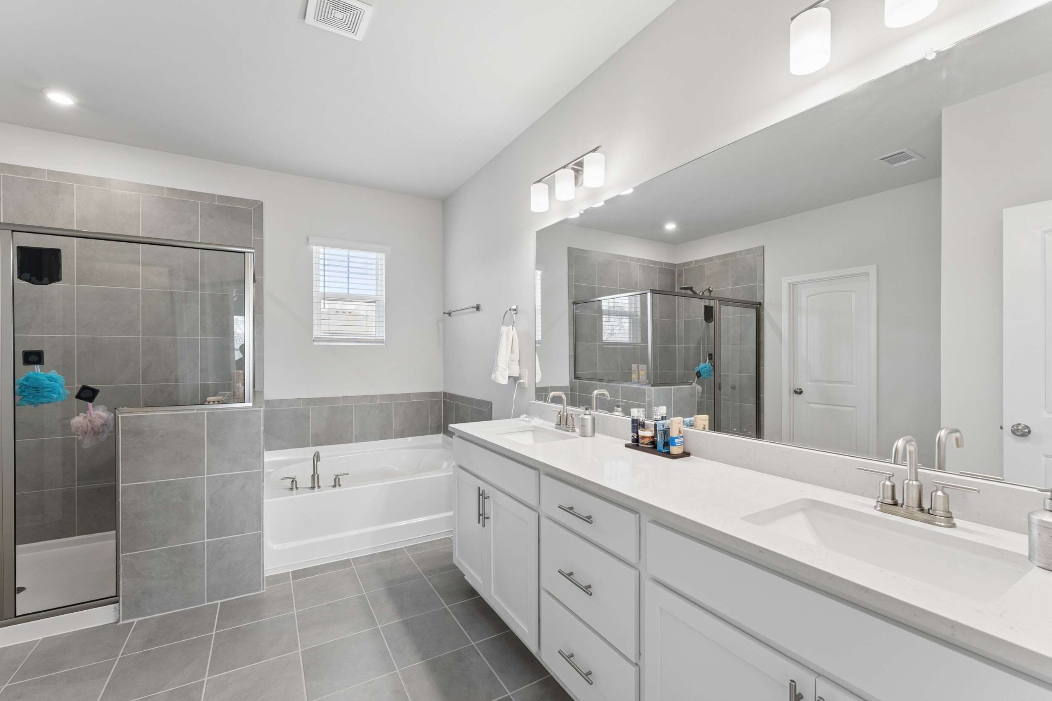 4107 Dwight Way Murfreesboro, TN 37128 - Photo 22 of 41 a bathroom with a double vanity sink mirror double and shower