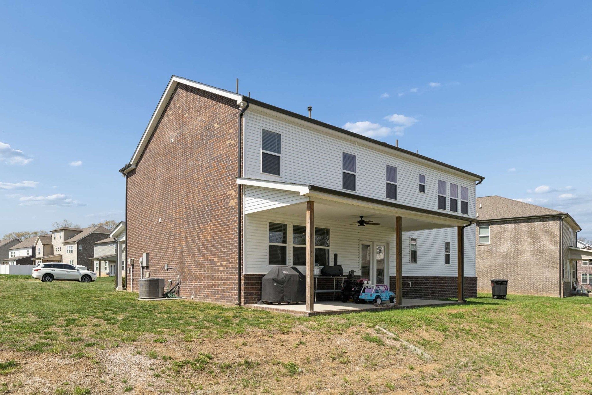 4107 Dwight Way Murfreesboro, TN 37128 - Photo 33 of 41 a view of a house with lawn chairs and a big yard