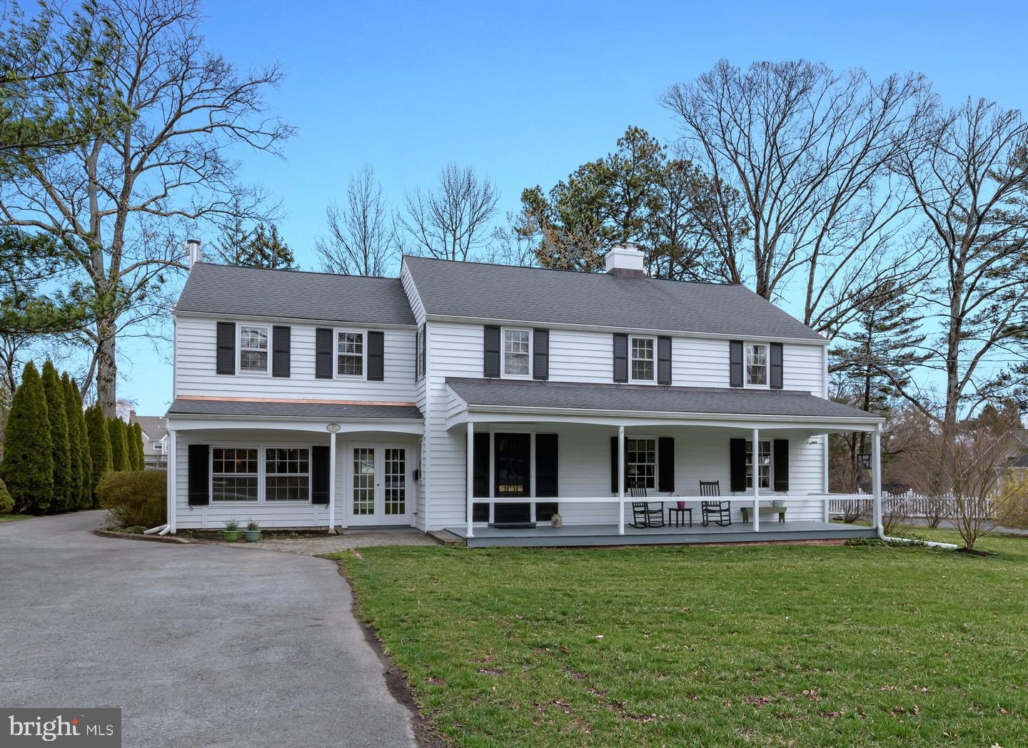 222 Dallam Road Newark, DE 19711 - Photo 2 of 34 front view of a brick house with a yard