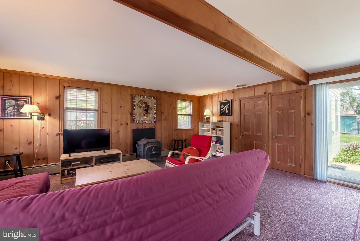 222 Dallam Road Newark, DE 19711 - Photo 17 of 34 a living room with furniture a flat screen tv and large window