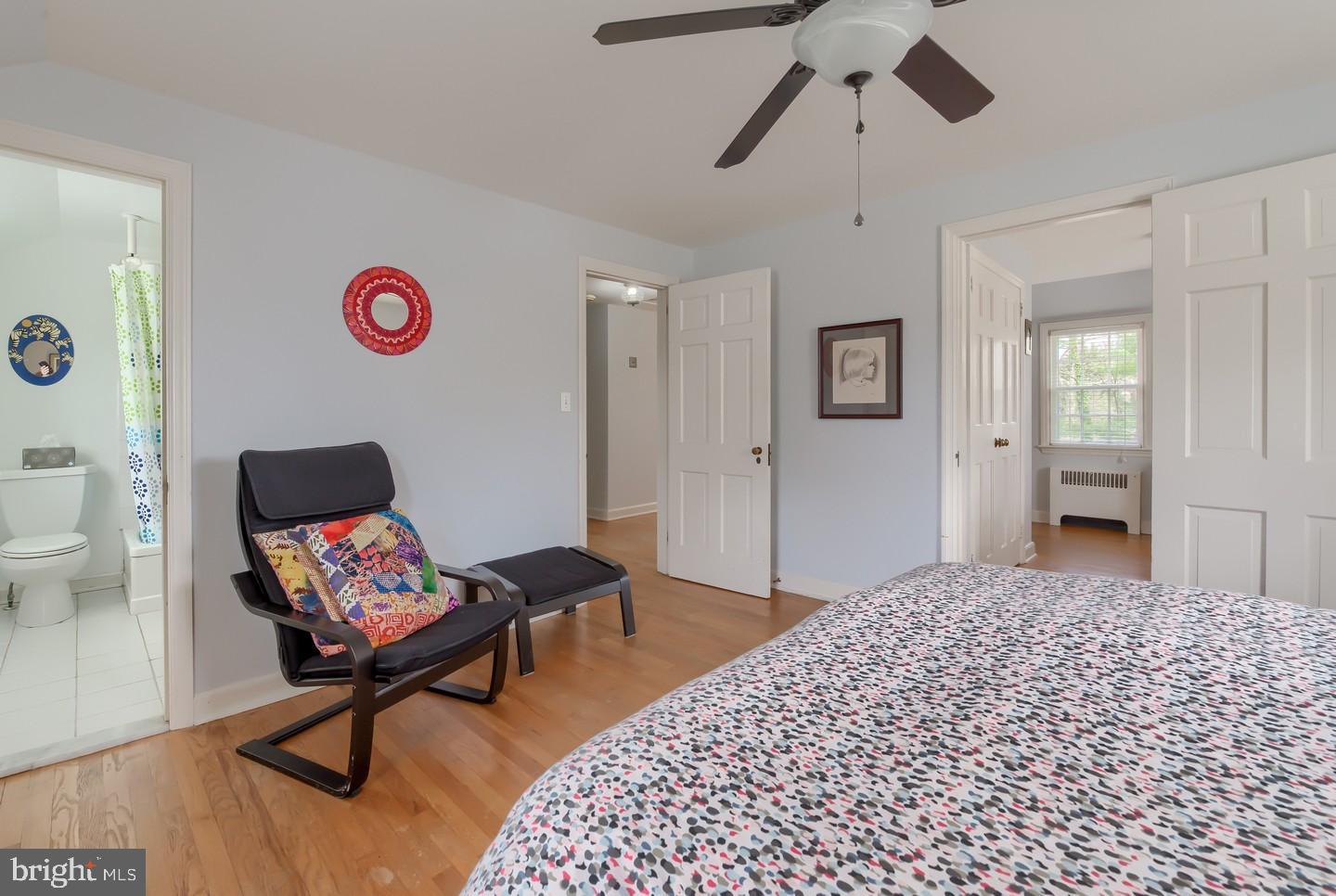 222 Dallam Road Newark, DE 19711 - Photo 22 of 34 a bedroom with a bed and a chandelier