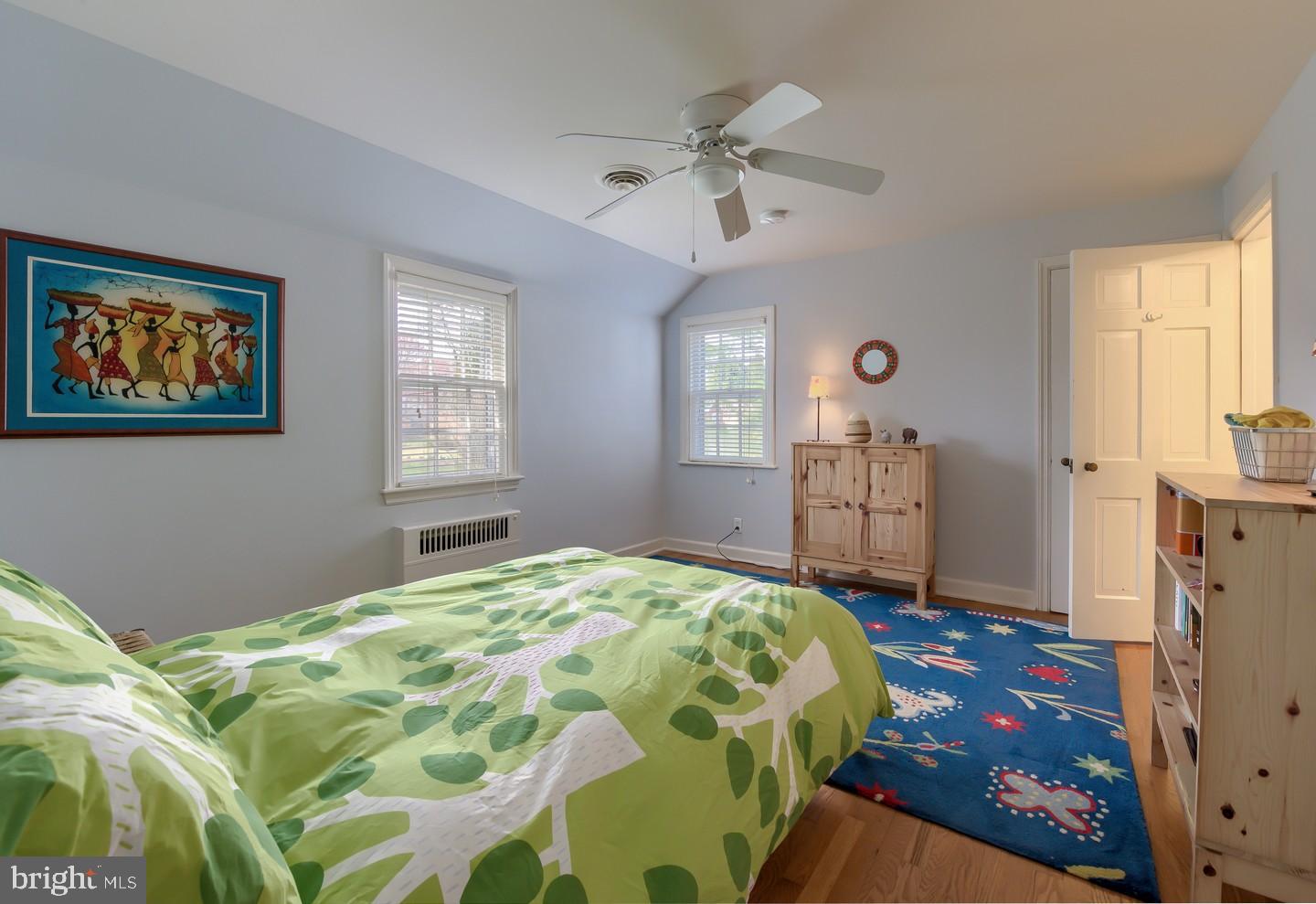 222 Dallam Road Newark, DE 19711 - Photo 26 of 34 a bedroom with a bed and a chandelier