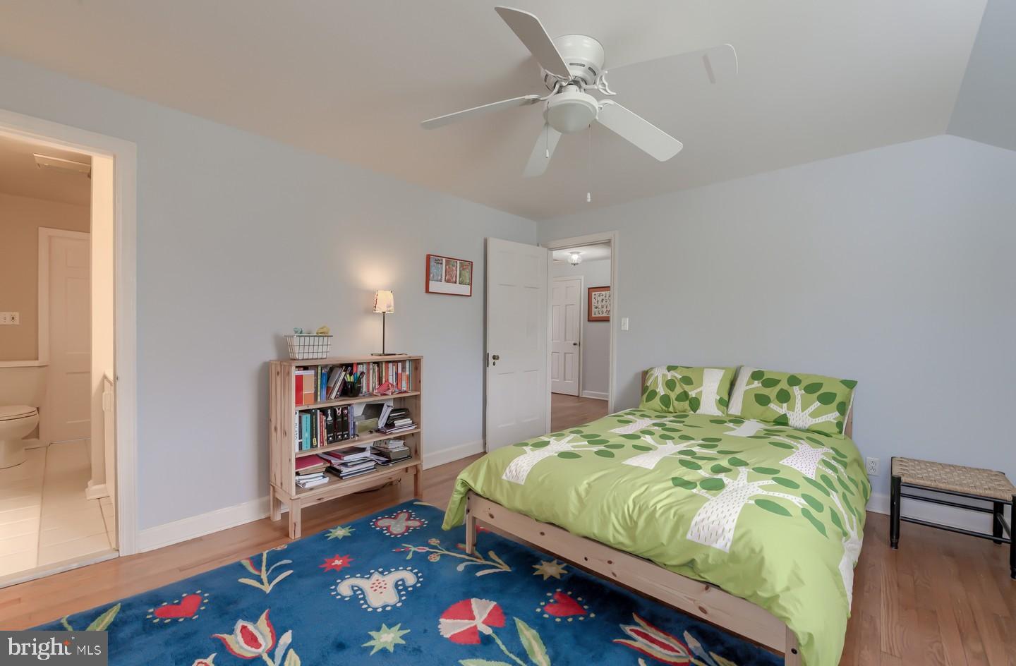 222 Dallam Road Newark, DE 19711 - Photo 27 of 34 a bedroom with a bed and a bookshelf