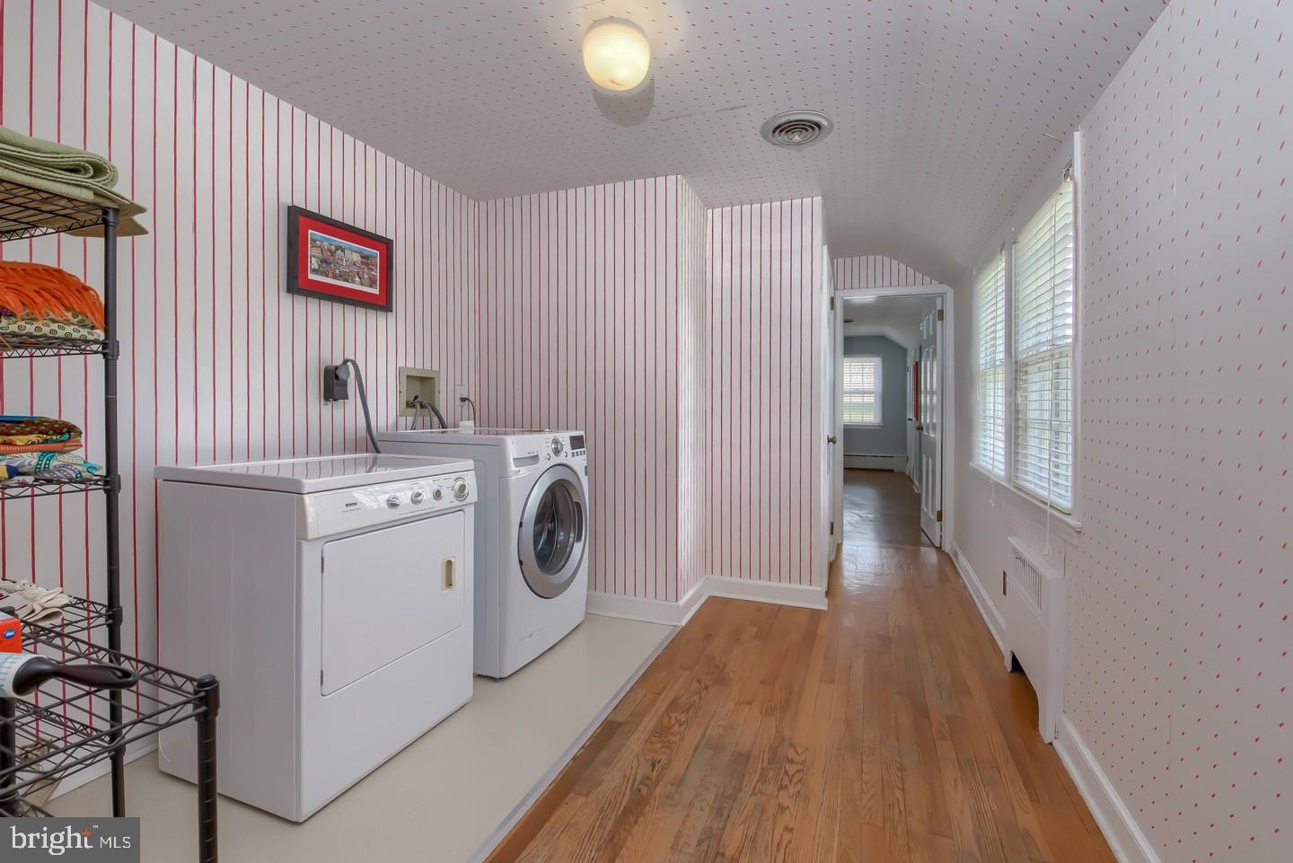 222 Dallam Road Newark, DE 19711 - Photo 31 of 34 a view of a hallway with washer and dryer