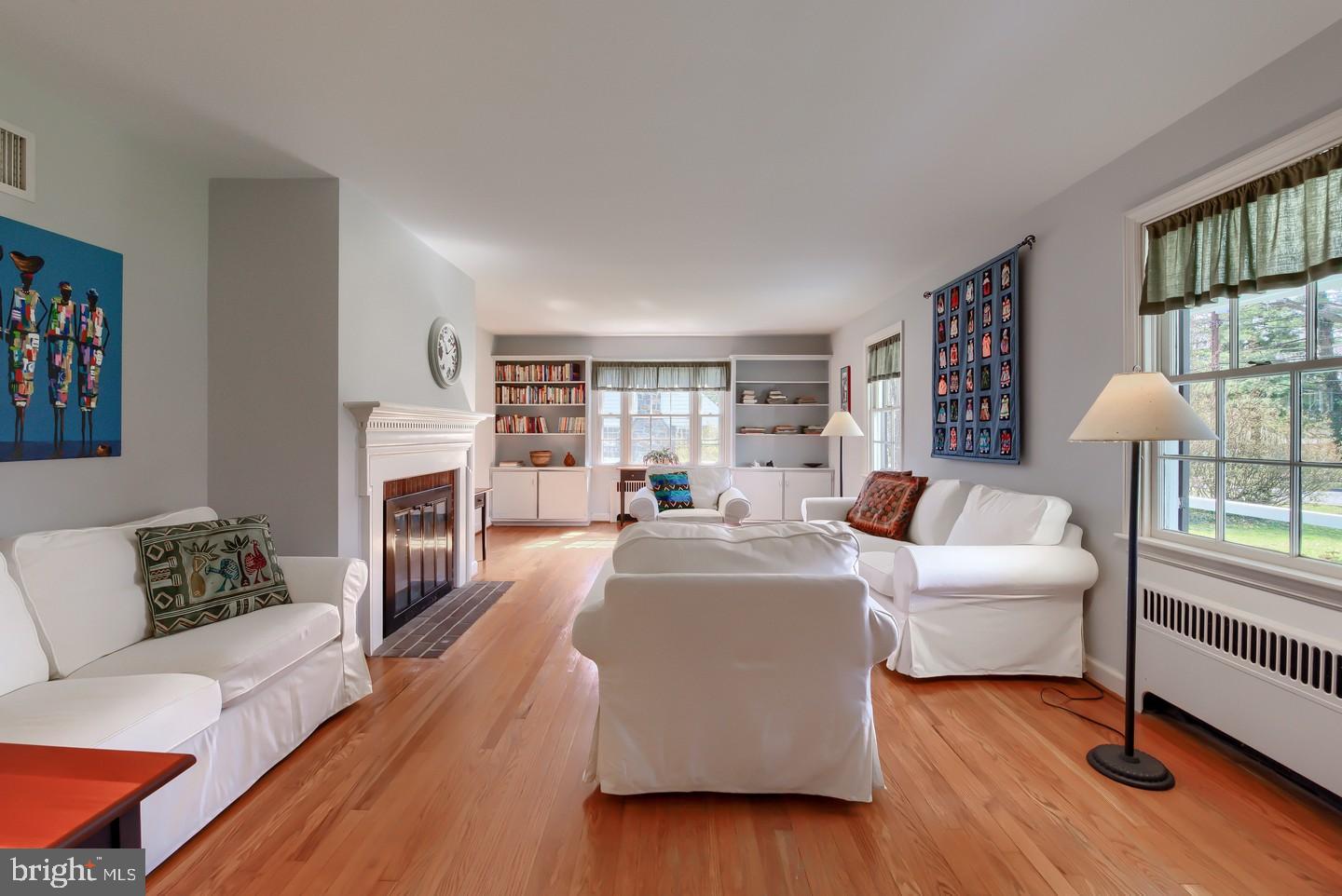 222 Dallam Road Newark, DE 19711 - Photo 6 of 34 a living room with furniture and a fireplace