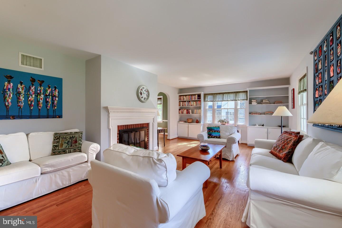 222 Dallam Road Newark, DE 19711 - Photo 7 of 34 a living room with furniture fireplace and a large window