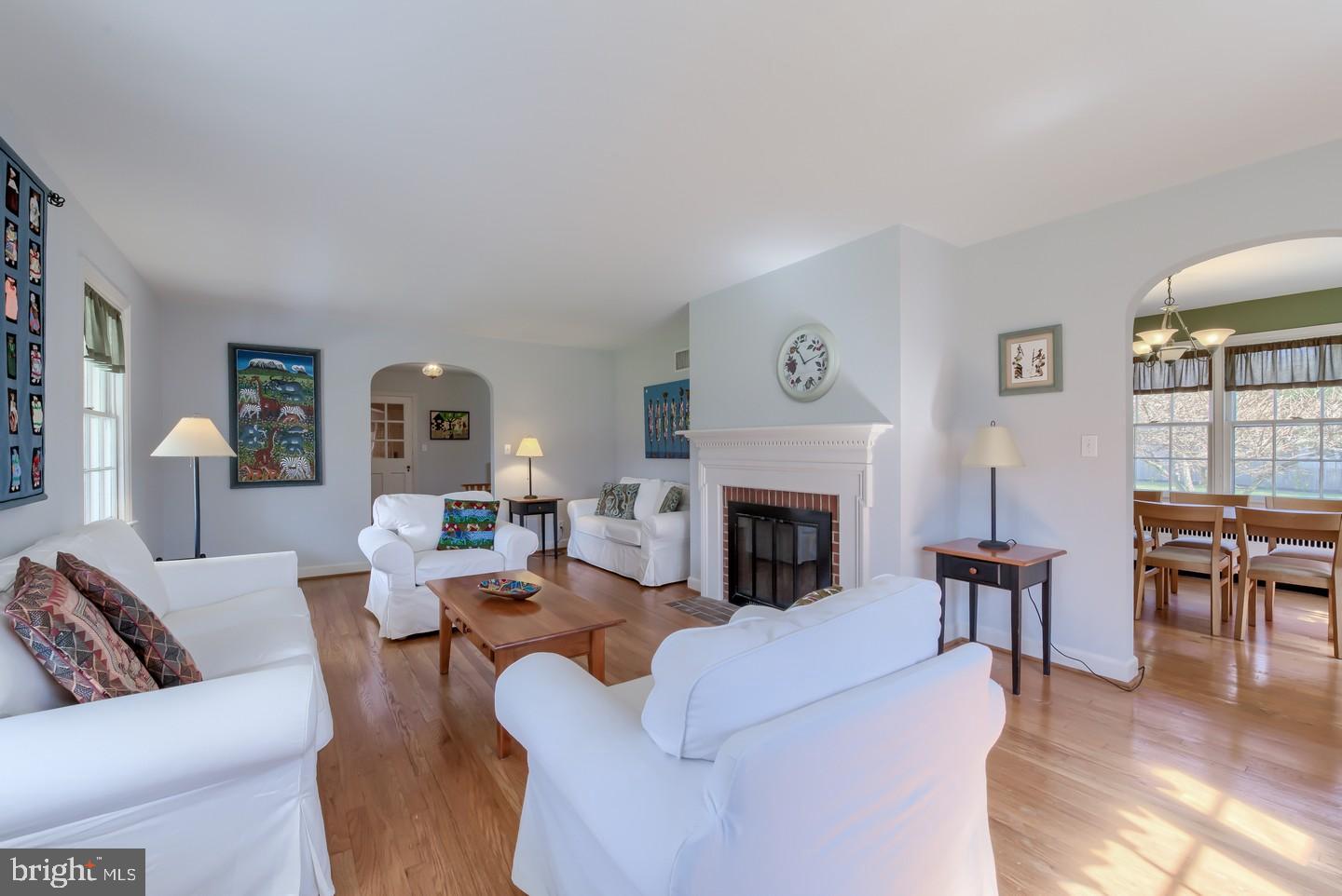 222 Dallam Road Newark, DE 19711 - Photo 8 of 34 a living room with furniture and a fireplace