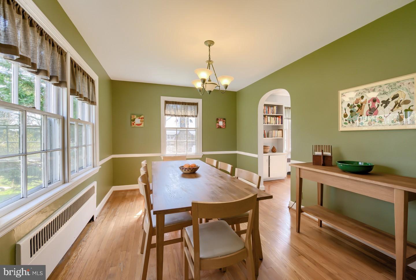 222 Dallam Road Newark, DE 19711 - Photo 10 of 34 a view of a dining room with furniture window and wooden floor