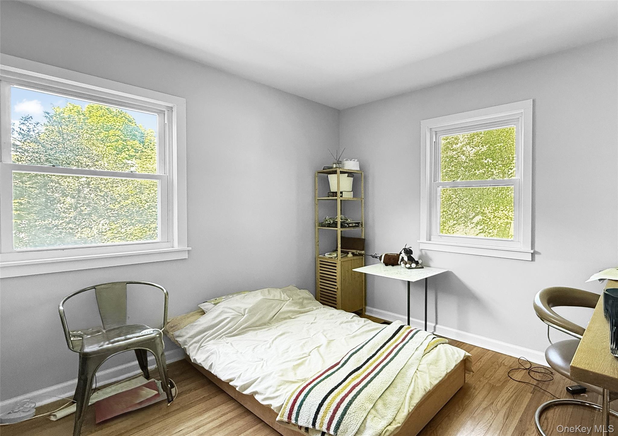 15 Whitehill Place Cold Spring, NY 10516 - Photo 7 of 12 a bedroom with a bed and a table