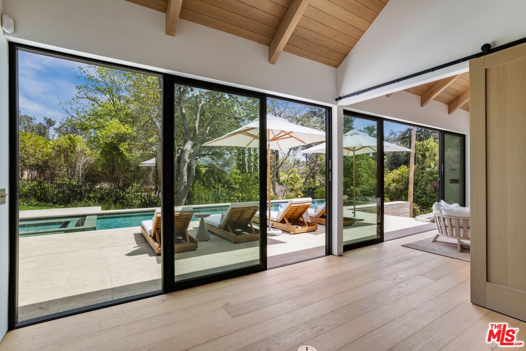 12309 Viewcrest Road Studio City, CA 91604 - Photo 41 of 49 a view of a room with window and wooden floor