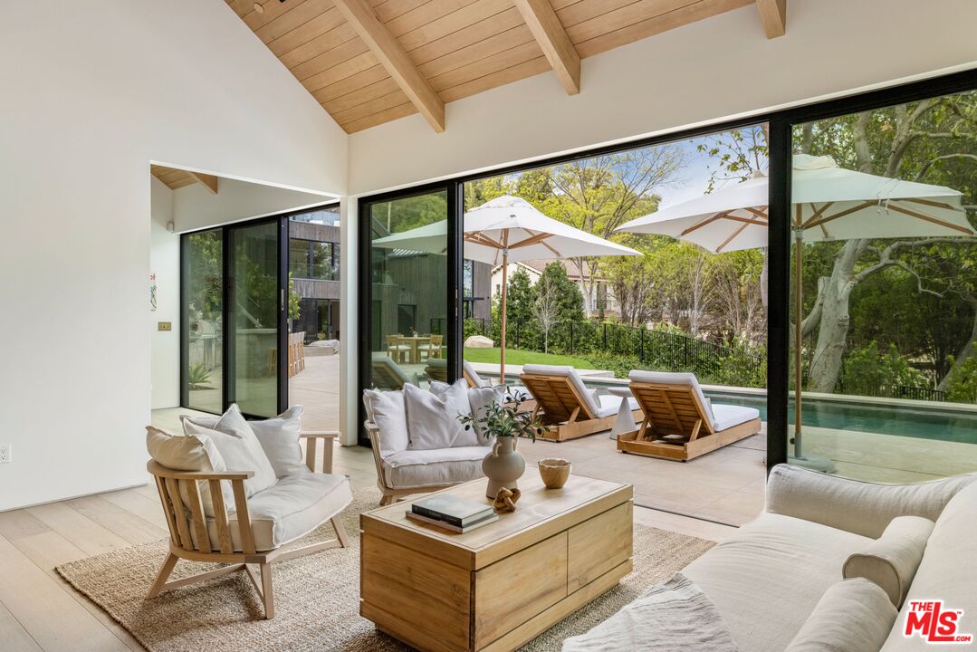 12309 Viewcrest Road Studio City, CA 91604 - Photo 42 of 49 a living room with furniture and a large window