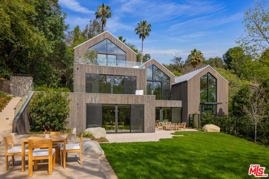 12309 Viewcrest Road Studio City, CA 91604 - Photo 48 of 49 a front view of a house with a yard