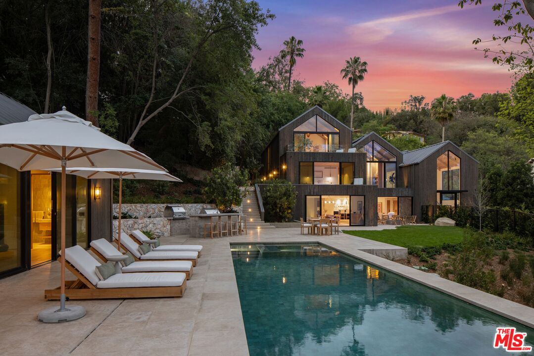 12309 Viewcrest Road Studio City, CA 91604 - Photo 49 of 49 a view of a house with swimming pool and sitting area