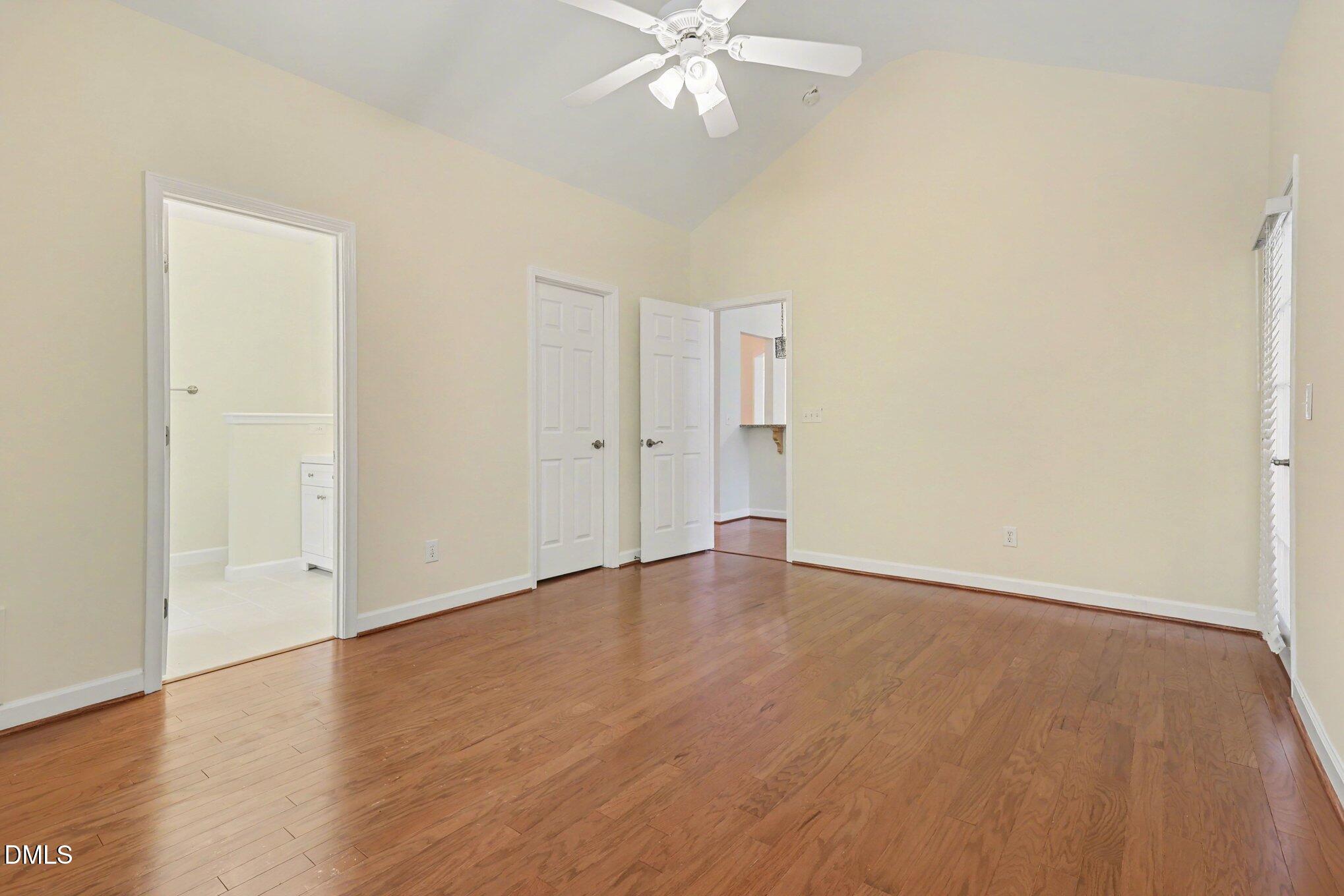 133 Jennel Way Durham, NC 27707 - Photo 13 of 28 a view of an empty room with wooden floor