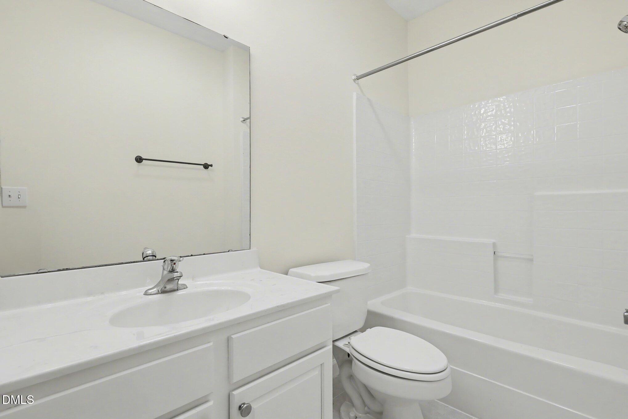 133 Jennel Way Durham, NC 27707 - Photo 19 of 28 a bathroom with a sink toilet and shower