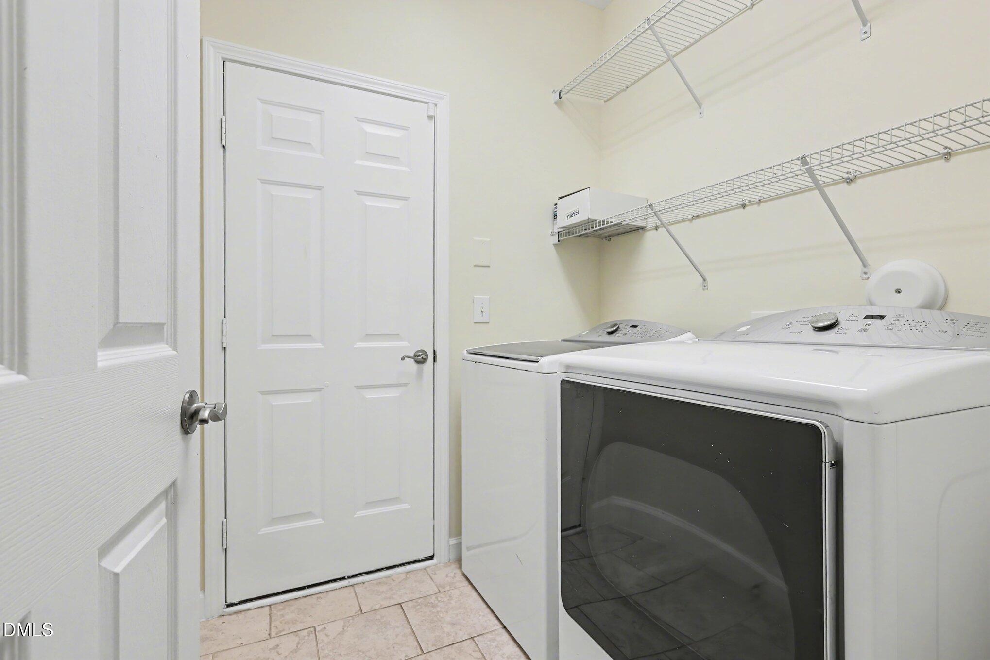133 Jennel Way Durham, NC 27707 - Photo 20 of 28 a utility room with dryer and washer