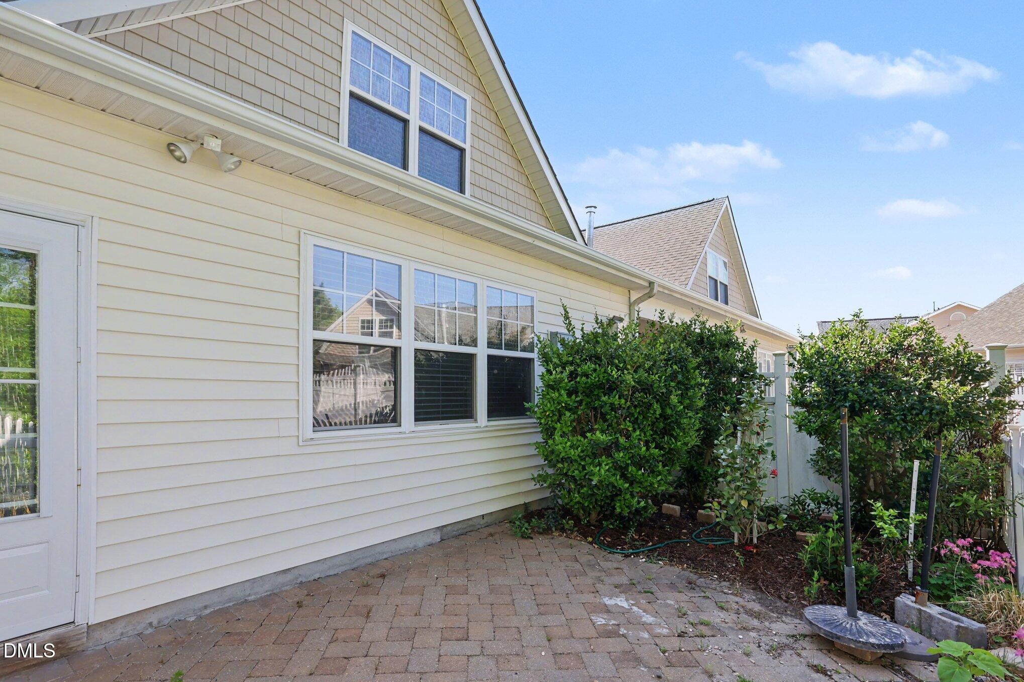 133 Jennel Way Durham, NC 27707 - Photo 26 of 28 a view of a house with a yard