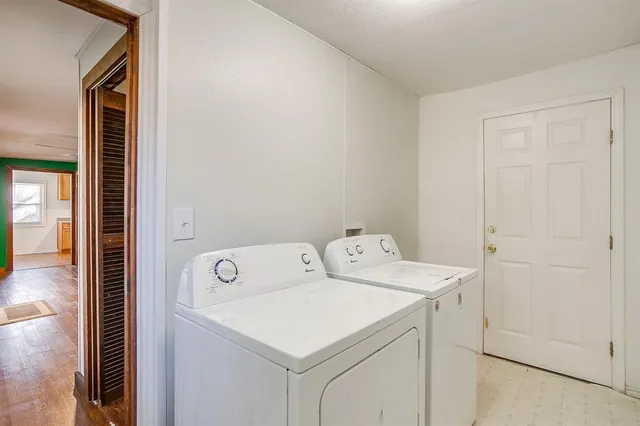 a utility room with dryer and washer