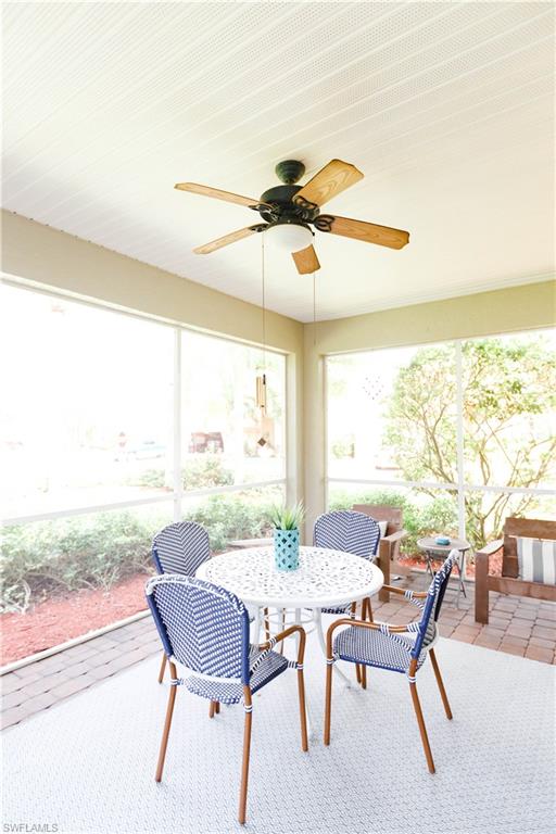 9349 Chestnut Tree Loop Fort Myers, FL 33967 - Photo 29 of 35 a view of a dining room with furniture window and outside view