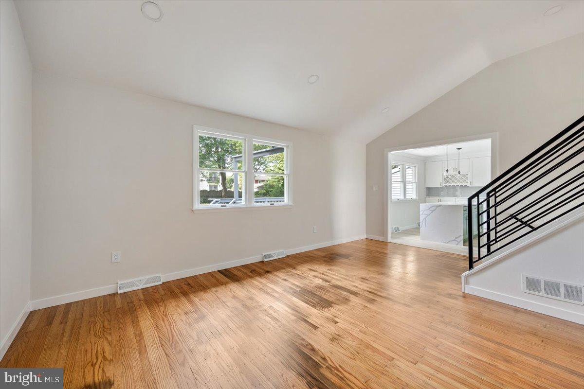 63 Baker Boulevard Marlton, NJ 08053 - Photo 11 of 38 a view of empty room with wooden floor and fan