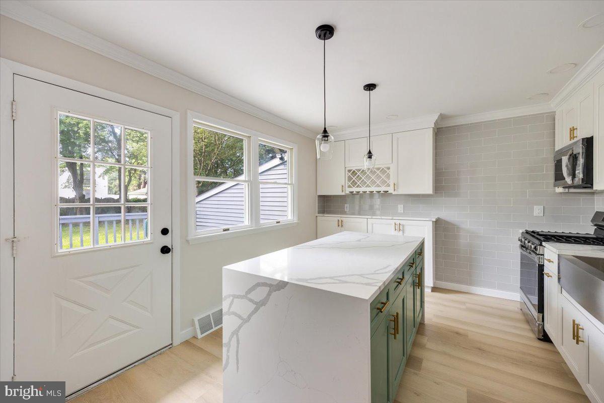 63 Baker Boulevard Marlton, NJ 08053 - Photo 12 of 38 a kitchen that has a sink a window and appliances