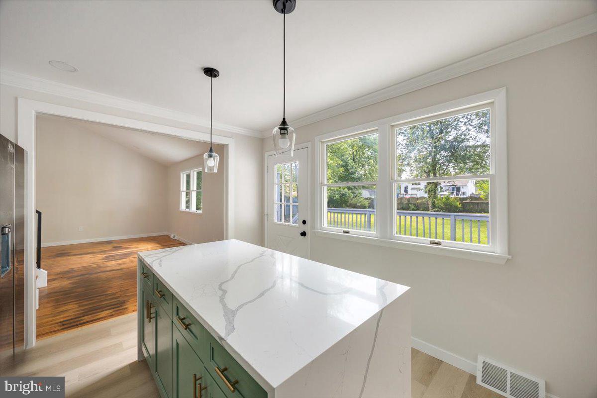 63 Baker Boulevard Marlton, NJ 08053 - Photo 17 of 38 a view of a kitchen and an empty room
