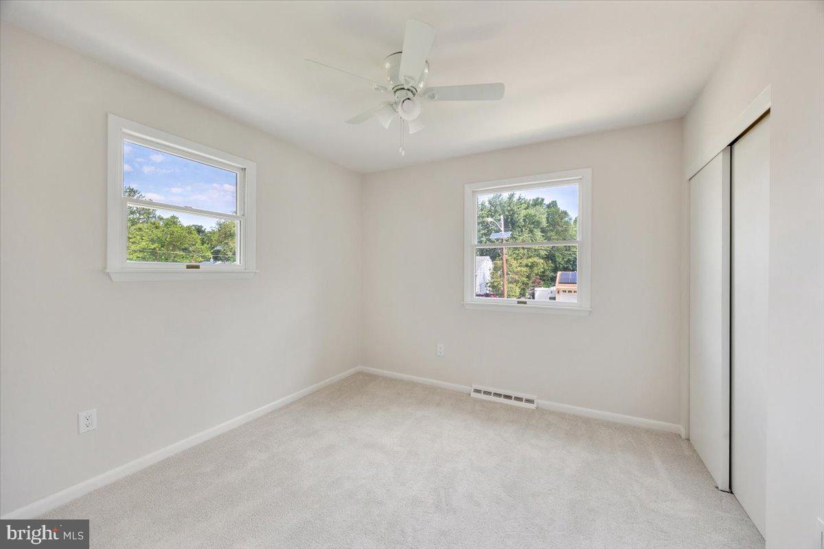 63 Baker Boulevard Marlton, NJ 08053 - Photo 18 of 38 an empty room with windows