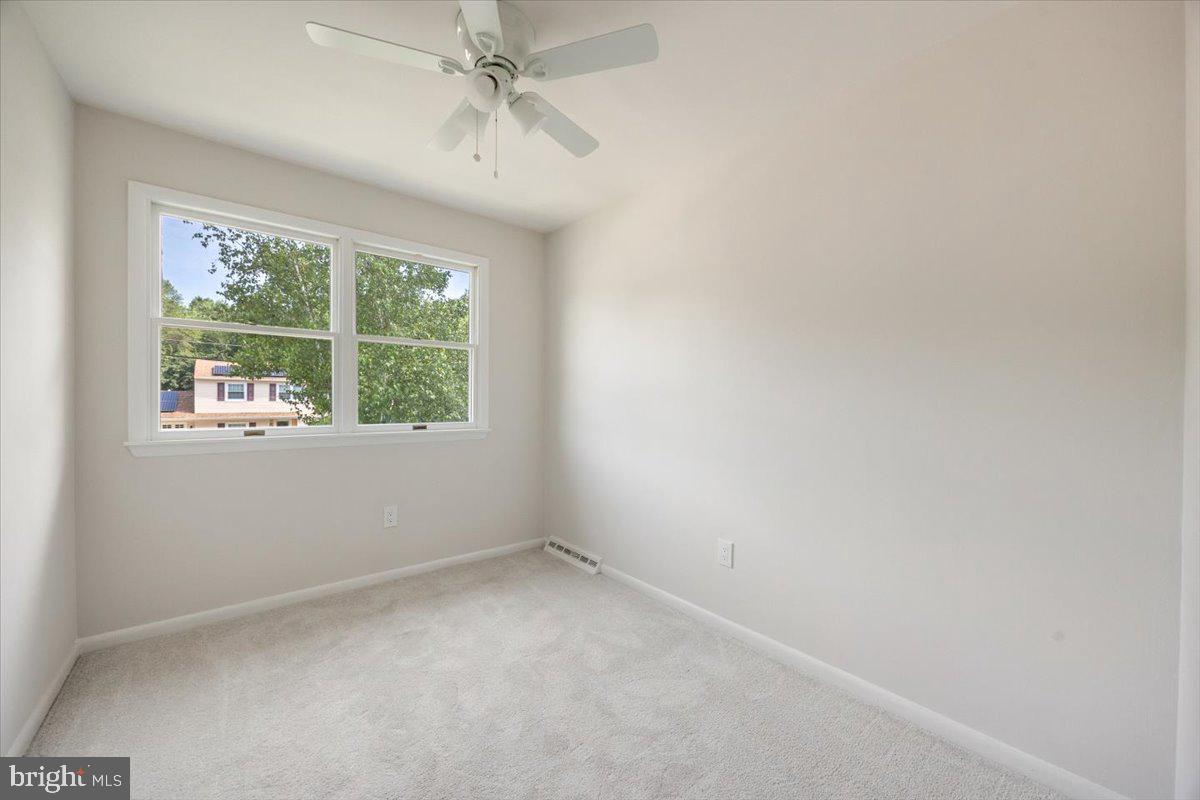 63 Baker Boulevard Marlton, NJ 08053 - Photo 20 of 38 an empty room with a window