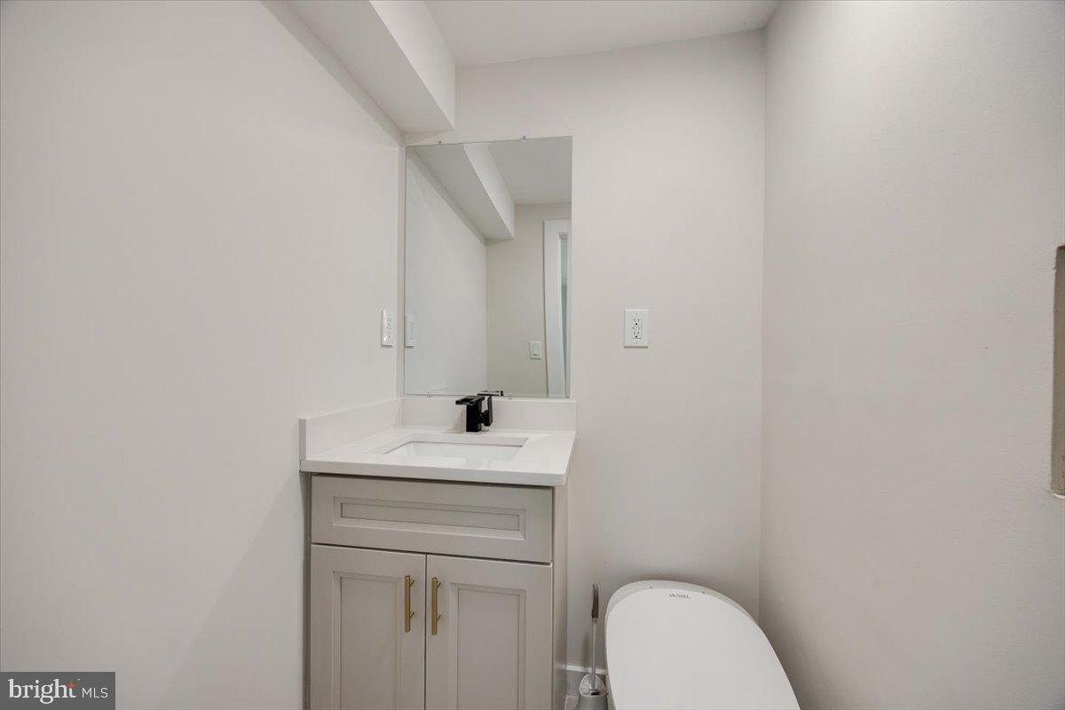 63 Baker Boulevard Marlton, NJ 08053 - Photo 28 of 38 a bathroom with a sink and a toilet