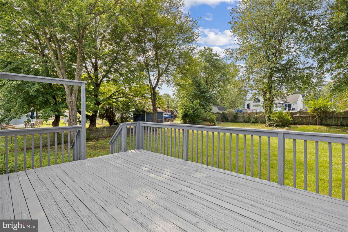 63 Baker Boulevard Marlton, NJ 08053 - Photo 30 of 38 a view of balcony with wooden floor and fence