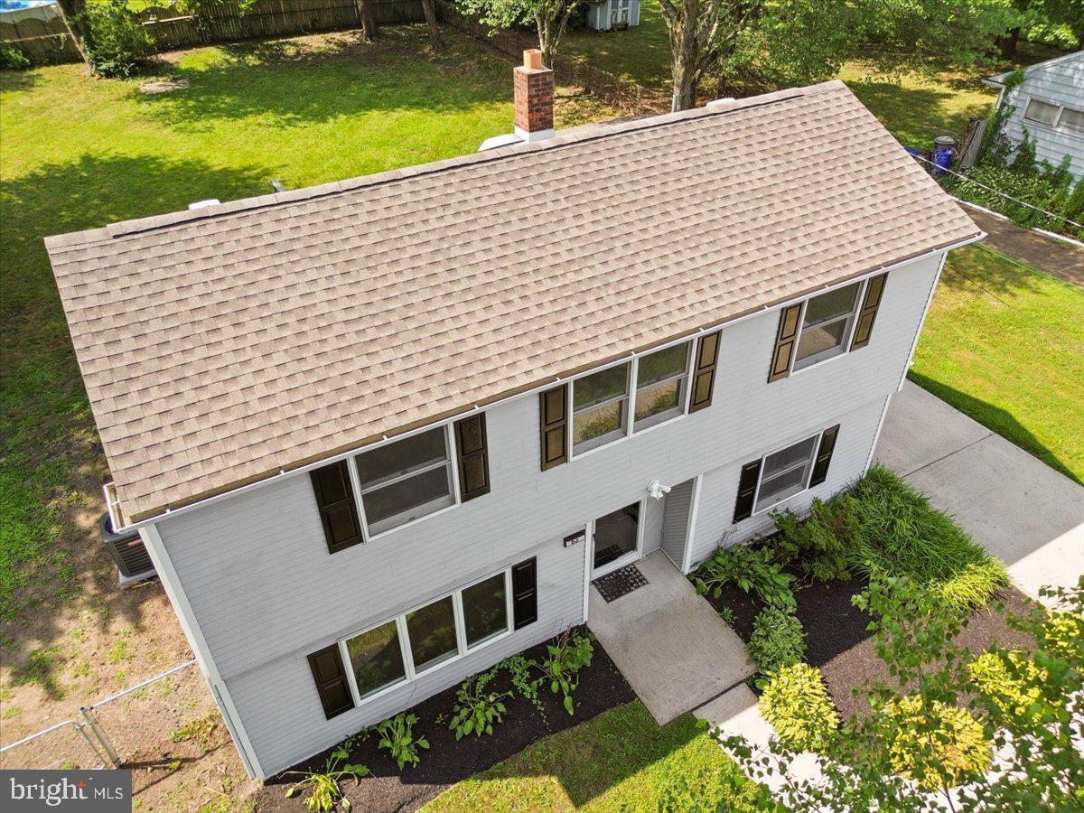 63 Baker Boulevard Marlton, NJ 08053 - Photo 31 of 38 a aerial view of a house with a yard