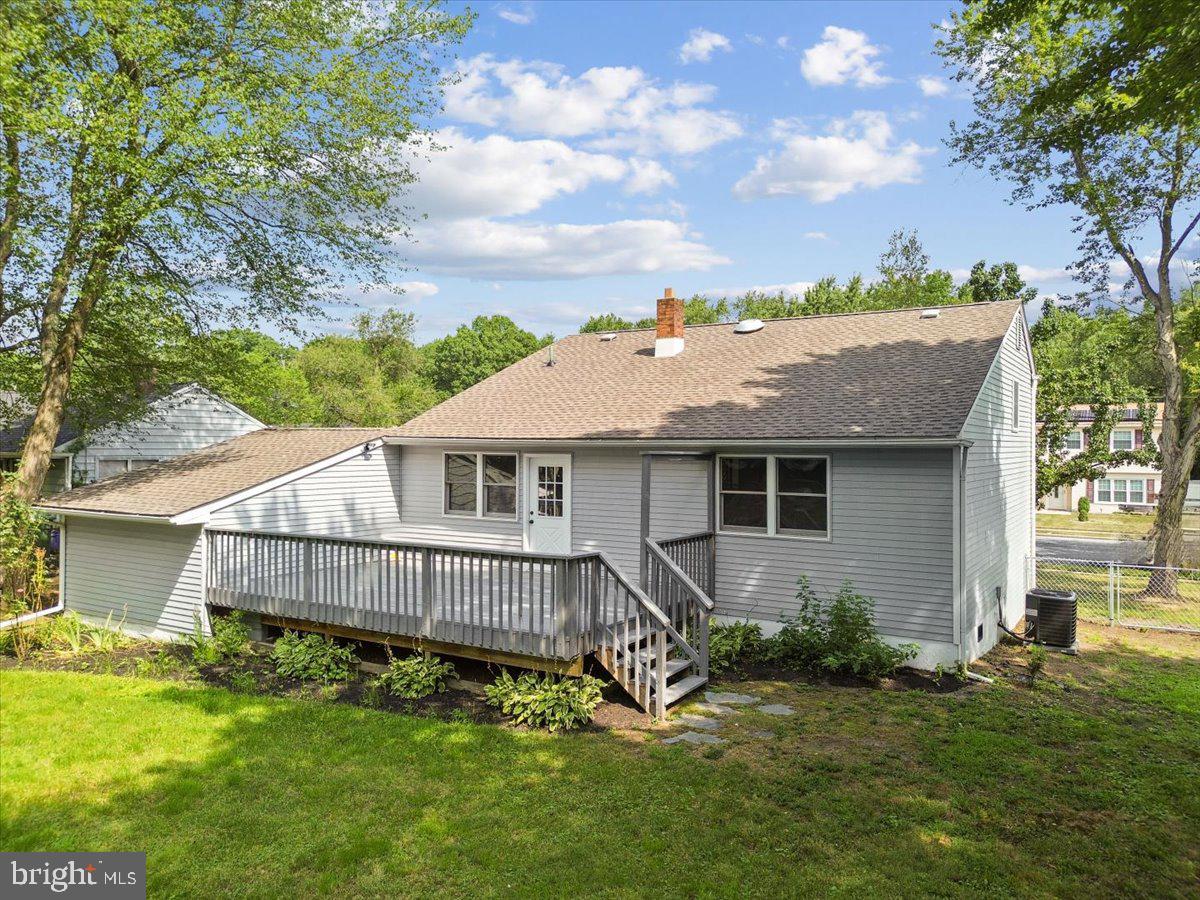 63 Baker Boulevard Marlton, NJ 08053 - Photo 36 of 38 a view of a house with a yard plants and large tree