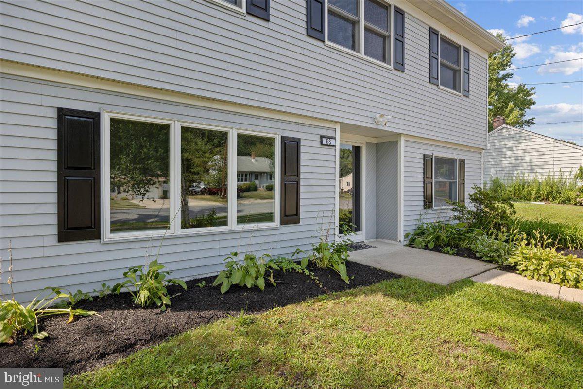63 Baker Boulevard Marlton, NJ 08053 - Photo 4 of 38 a front view of a house