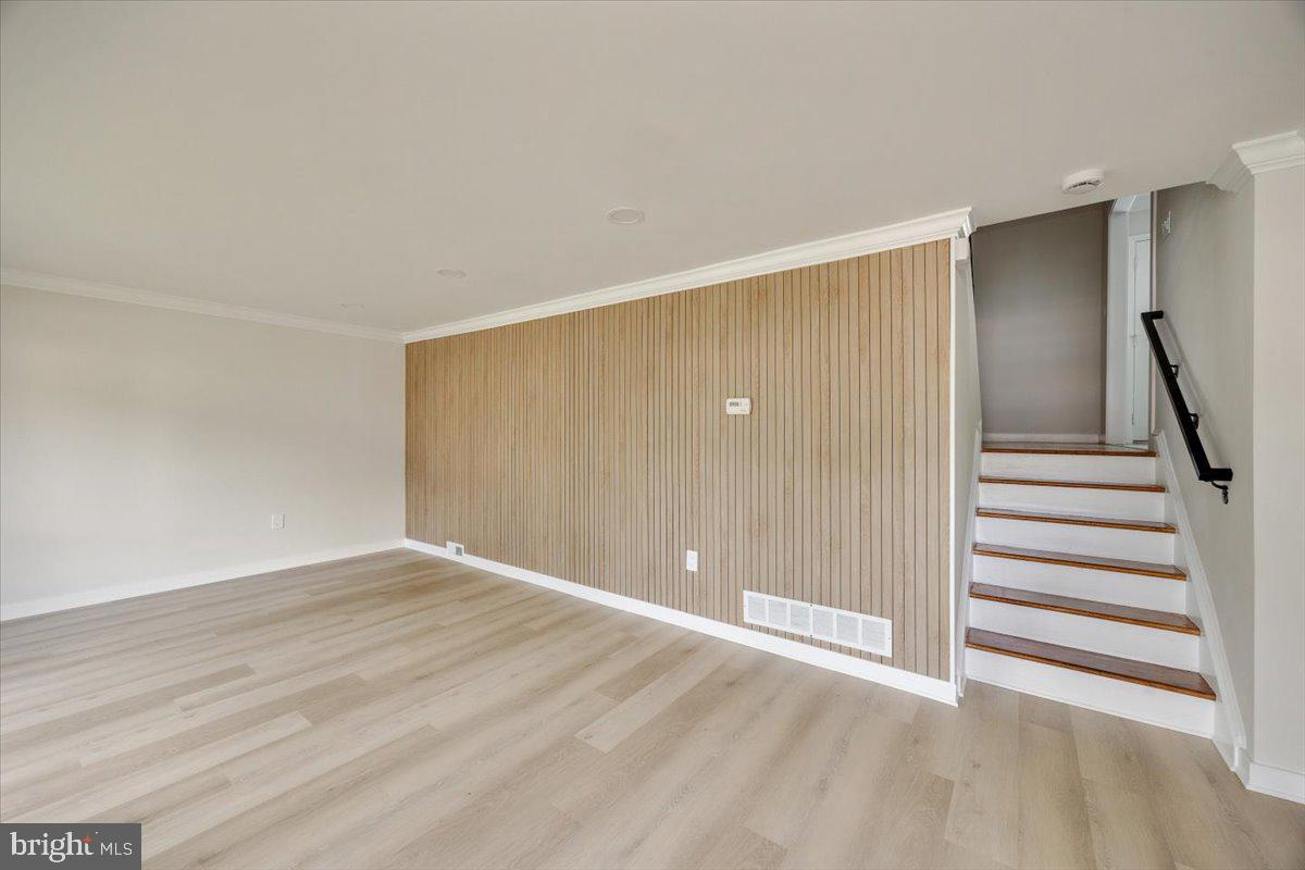 63 Baker Boulevard Marlton, NJ 08053 - Photo 5 of 38 a view of an empty room with wooden floor and entryway