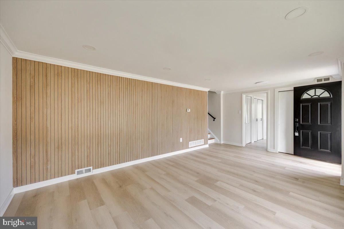 63 Baker Boulevard Marlton, NJ 08053 - Photo 7 of 38 a view of an empty room with window and stairs