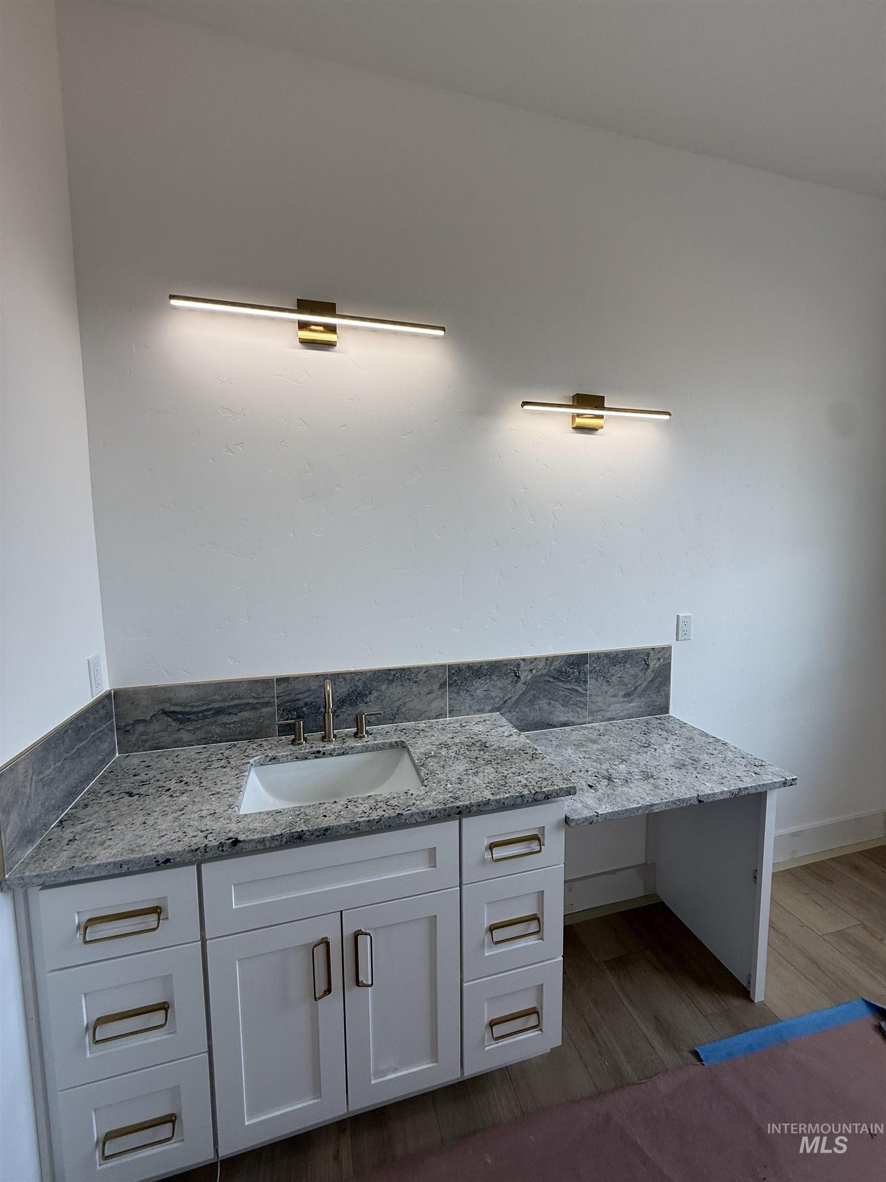 23739 Legends Lane Caldwell, ID 83607 - Photo 8 of 9 Bathroom with vanity and light wood finished floors