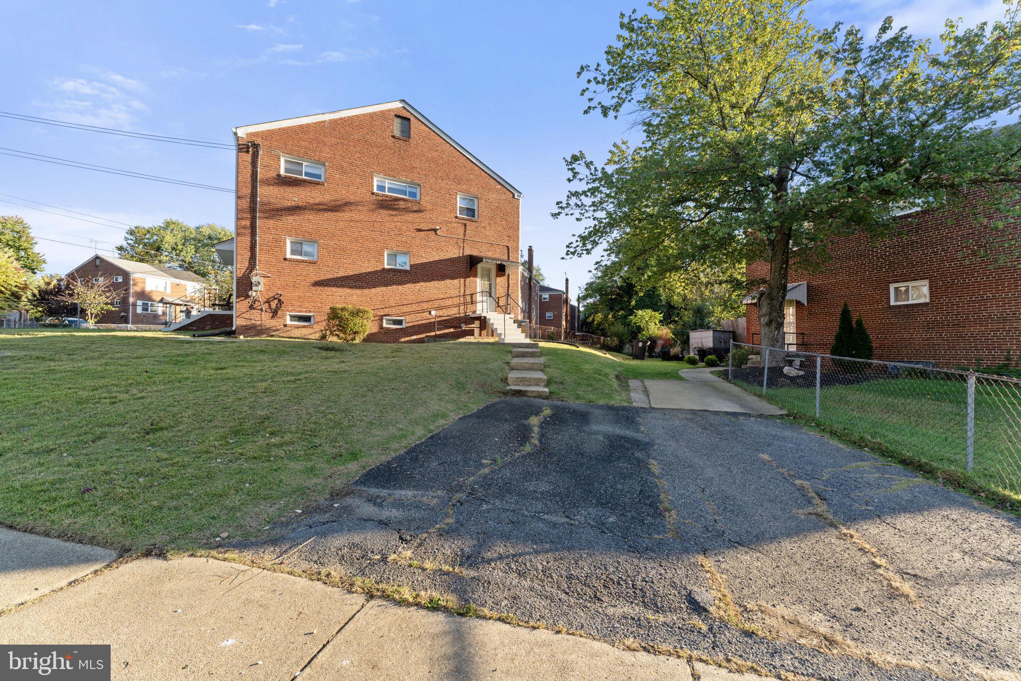2605 Keith Street Temple Hills, MD 20748 - Photo 19 of 20 a front view of a house with garden