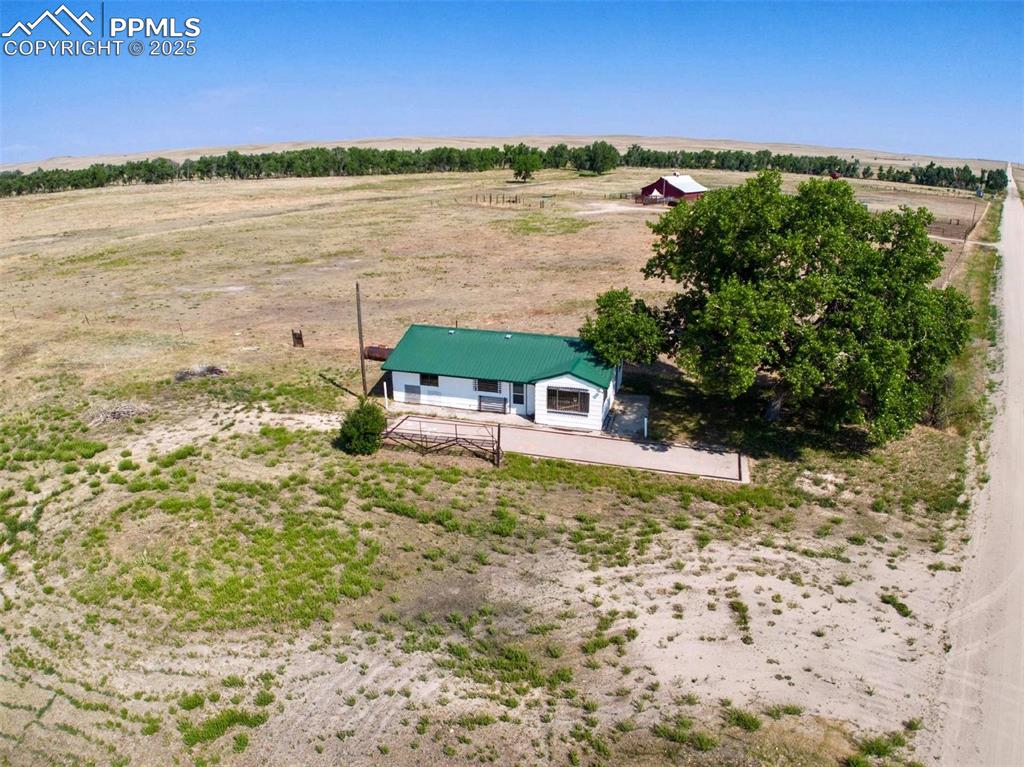 21134 Main Street Matheson, CO 80830 - Photo 2 of 11 a view of a lake with a mountain in the background