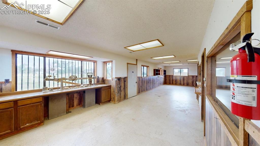 21134 Main Street Matheson, CO 80830 - Photo 6 of 11 a large living room with stainless steel appliances granite countertop lots of counter top space and furniture