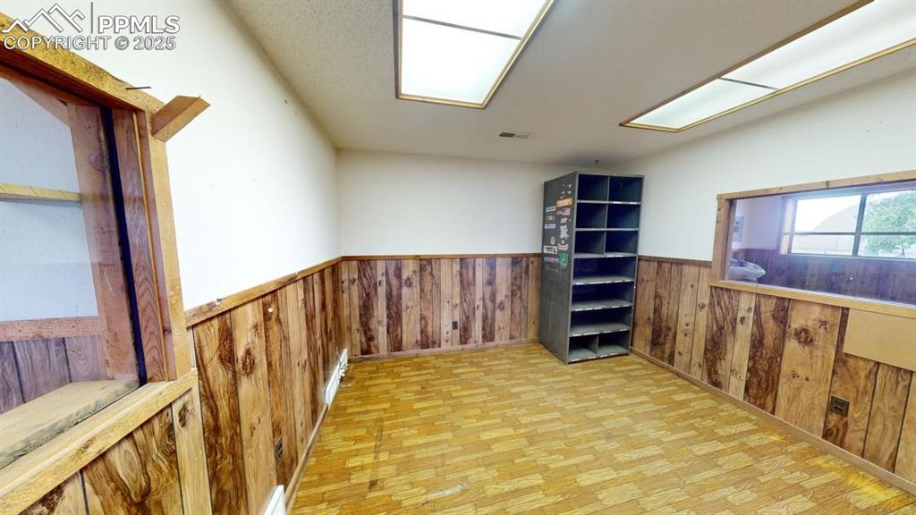 21134 Main Street Matheson, CO 80830 - Photo 9 of 11 a view of walk in closet with clothes and shoes