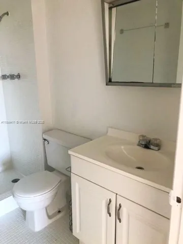 a bathroom with a sink and a toilet