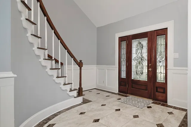 a view of entryway with a front door